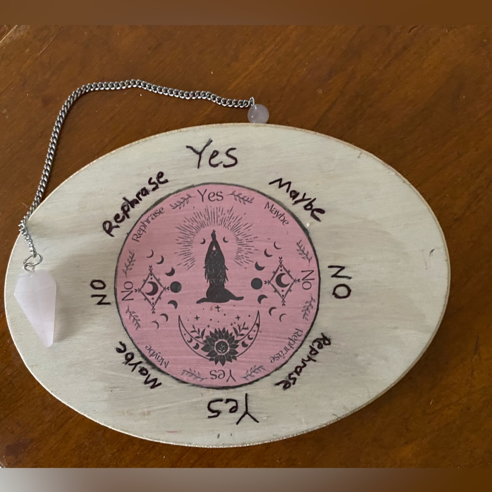 Wicca divination board and rose quartz pendulum